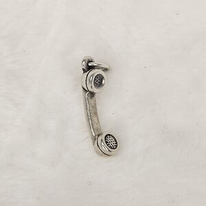 retired James Avery sterling silver telephone receiver charm.